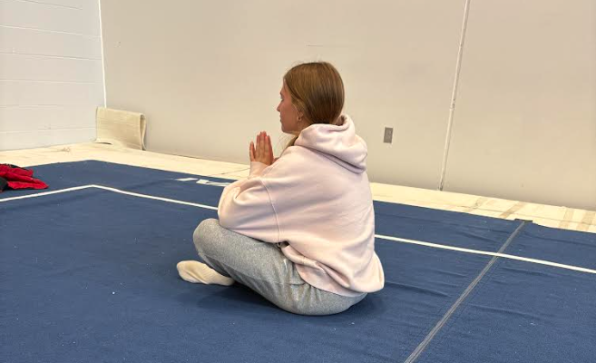 Junior Jillian Maddux is meditating to work on calming down and refocusing. This can help improve mental health by assisting with reducing stress.